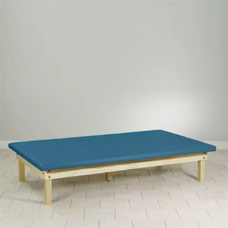 Wood Frame Exam Table with Upholstered Platform Top Wooden Frame Platform Mat Table with Upholstered Top • 60"W x 84"L x 18"H ,1 Each